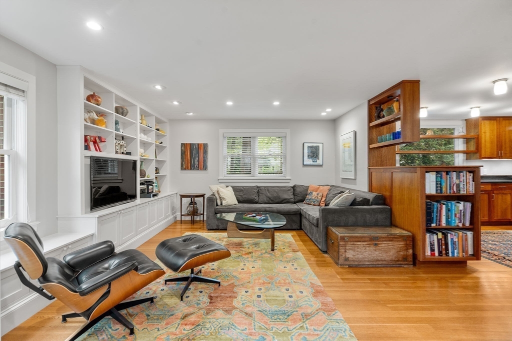 33 Manchester Road Newton, MA 02461 - Photo 9 of 31 a living room with furniture and a flat screen tv