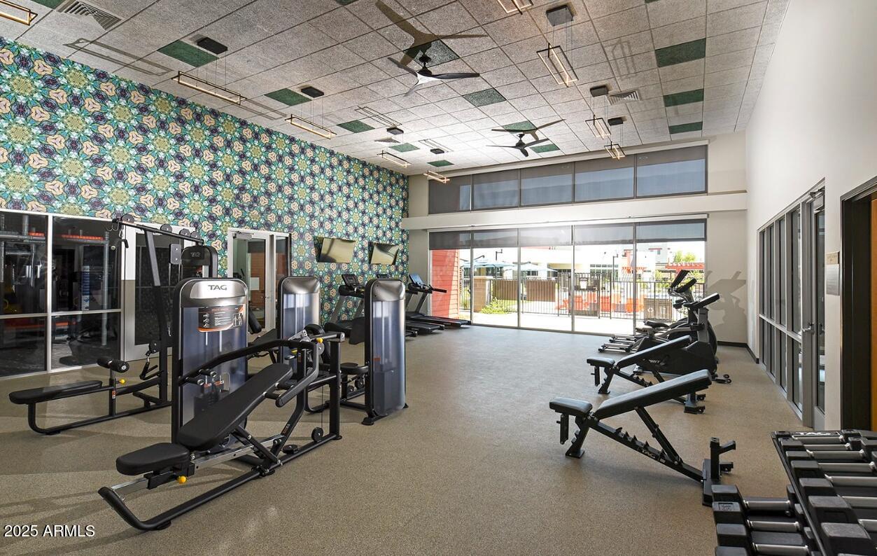 7800 West Encanto Boulevard, Unit 2 Phoenix, AZ 85035 - Photo 9 of 14 a view of a room with gym equipment