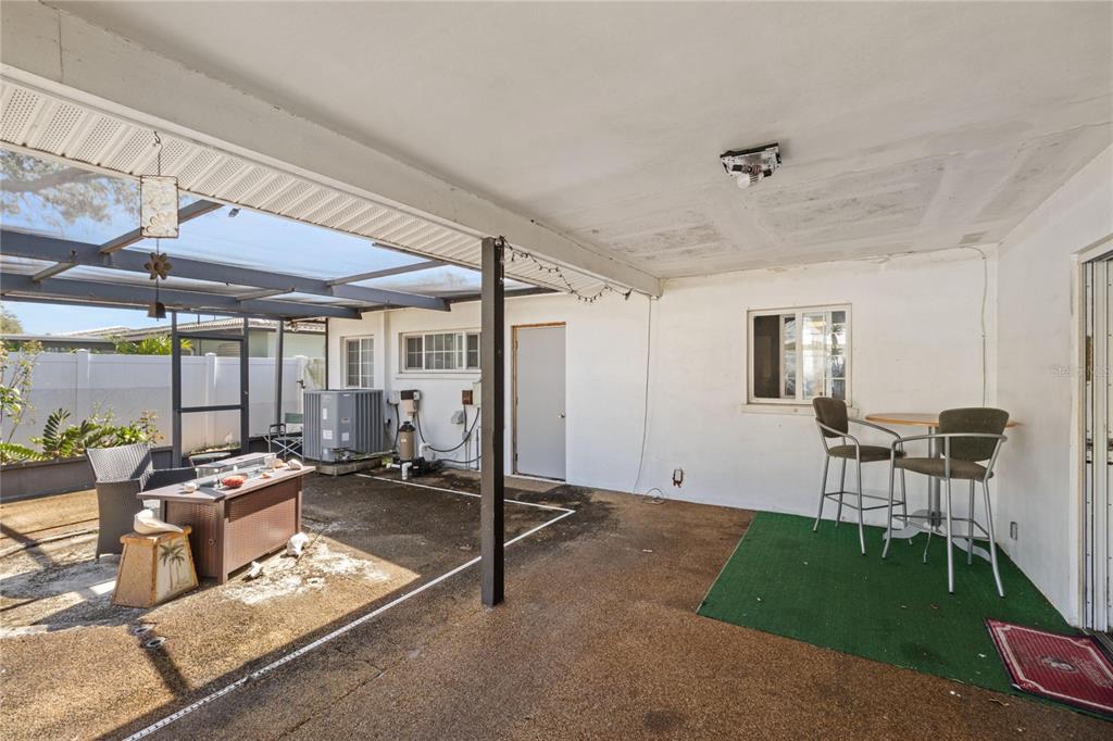 820 3rd Avenue Southwest Largo, FL 33770 - Photo 21 of 25 a room with furniture and a table