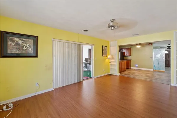 a view of a livingroom with wooden floor