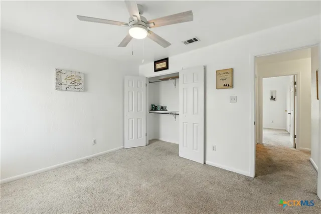 a view of a backyard of the house