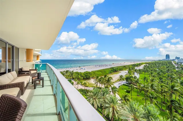 a view of balcony with furniture
