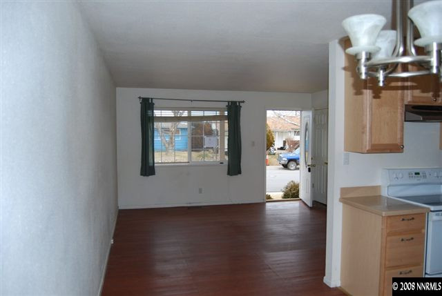 1095 Akard Drive Reno, NV 89503 - Photo 3 of 9 a view of a kitchen with wooden floor