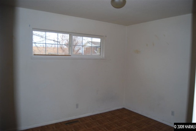 1095 Akard Drive Reno, NV 89503 - Photo 8 of 9 a view of an empty room and window