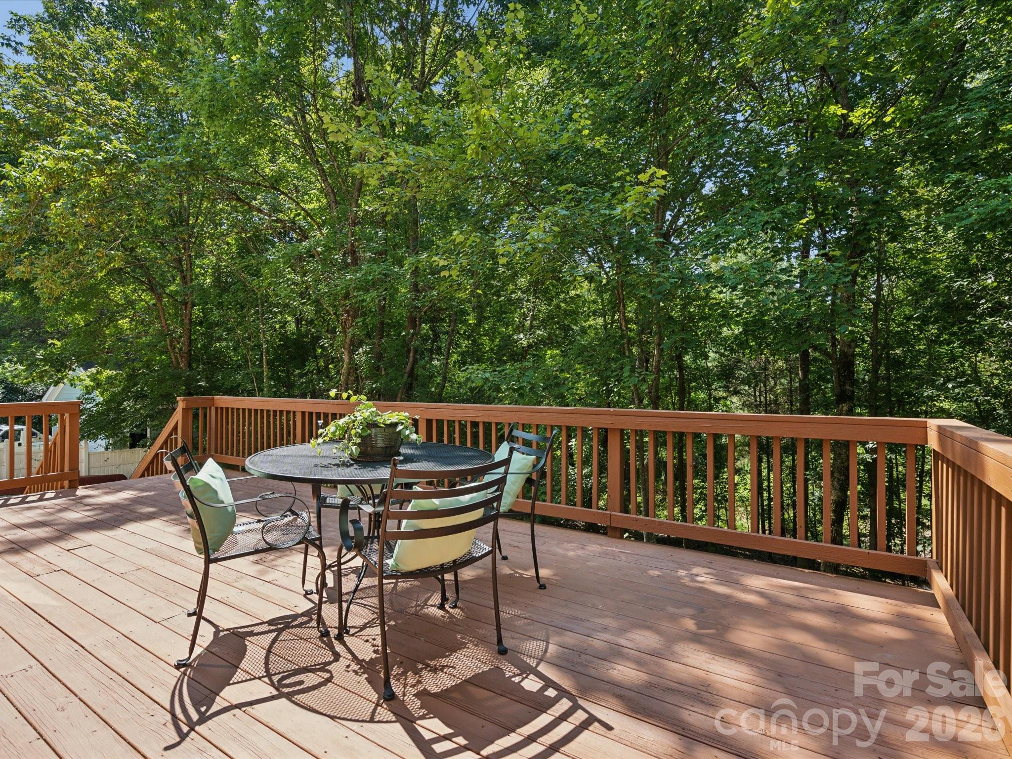 927 Derick's Crossing Fort Mill, SC 29708 - Photo 24 of 48 a view of a chair and table on the wooden floor