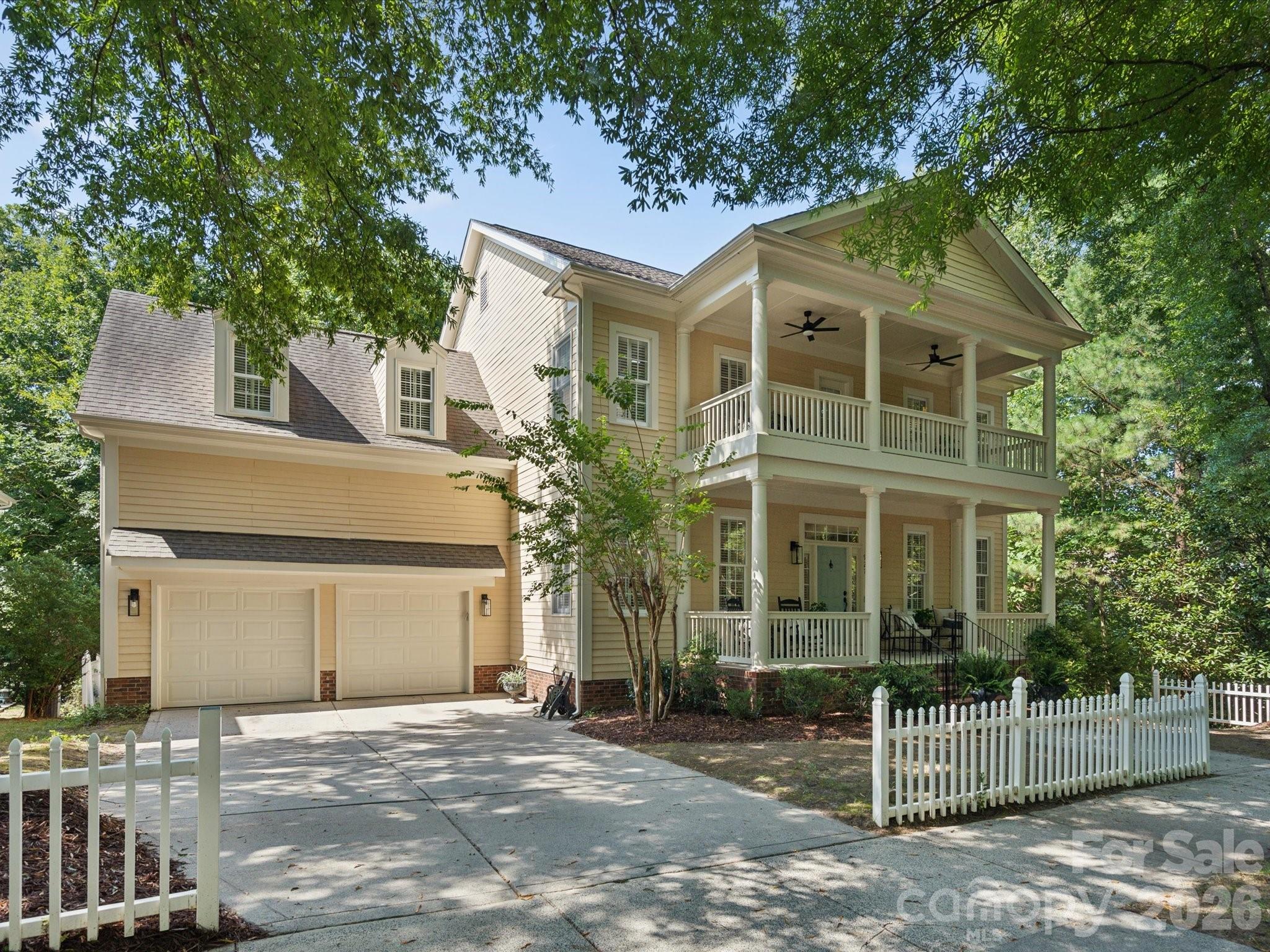 927 Derick's Crossing Fort Mill, SC 29708 - Photo 3 of 48 a front view of a house with a porch