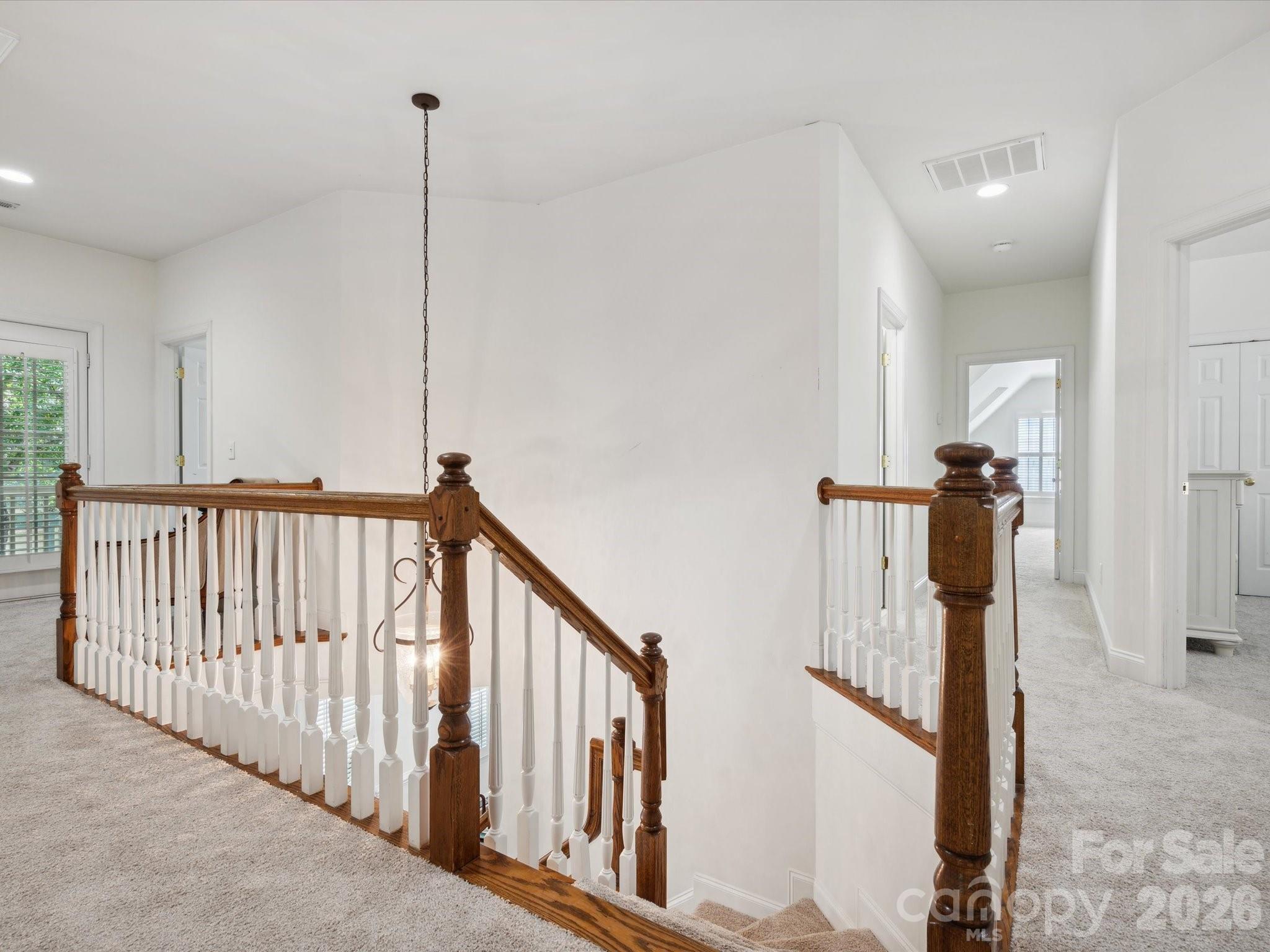 927 Derick's Crossing Fort Mill, SC 29708 - Photo 31 of 48 a view of a hallway with windows