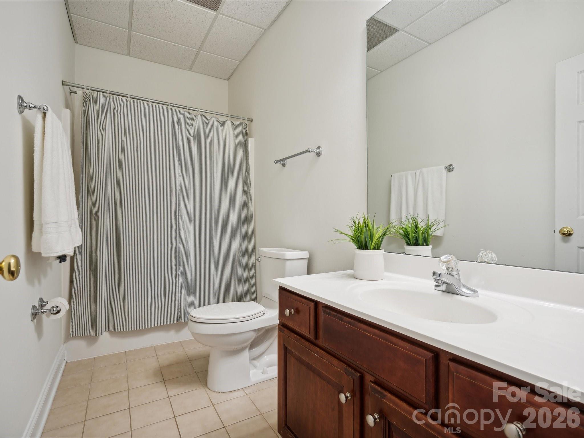 927 Derick's Crossing Fort Mill, SC 29708 - Photo 42 of 48 a bathroom with a sink a toilet and shower