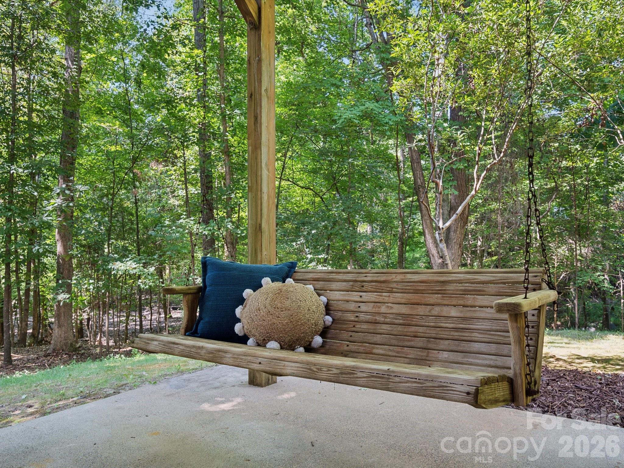 927 Derick's Crossing Fort Mill, SC 29708 - Photo 44 of 48 a view of a bench in a garden