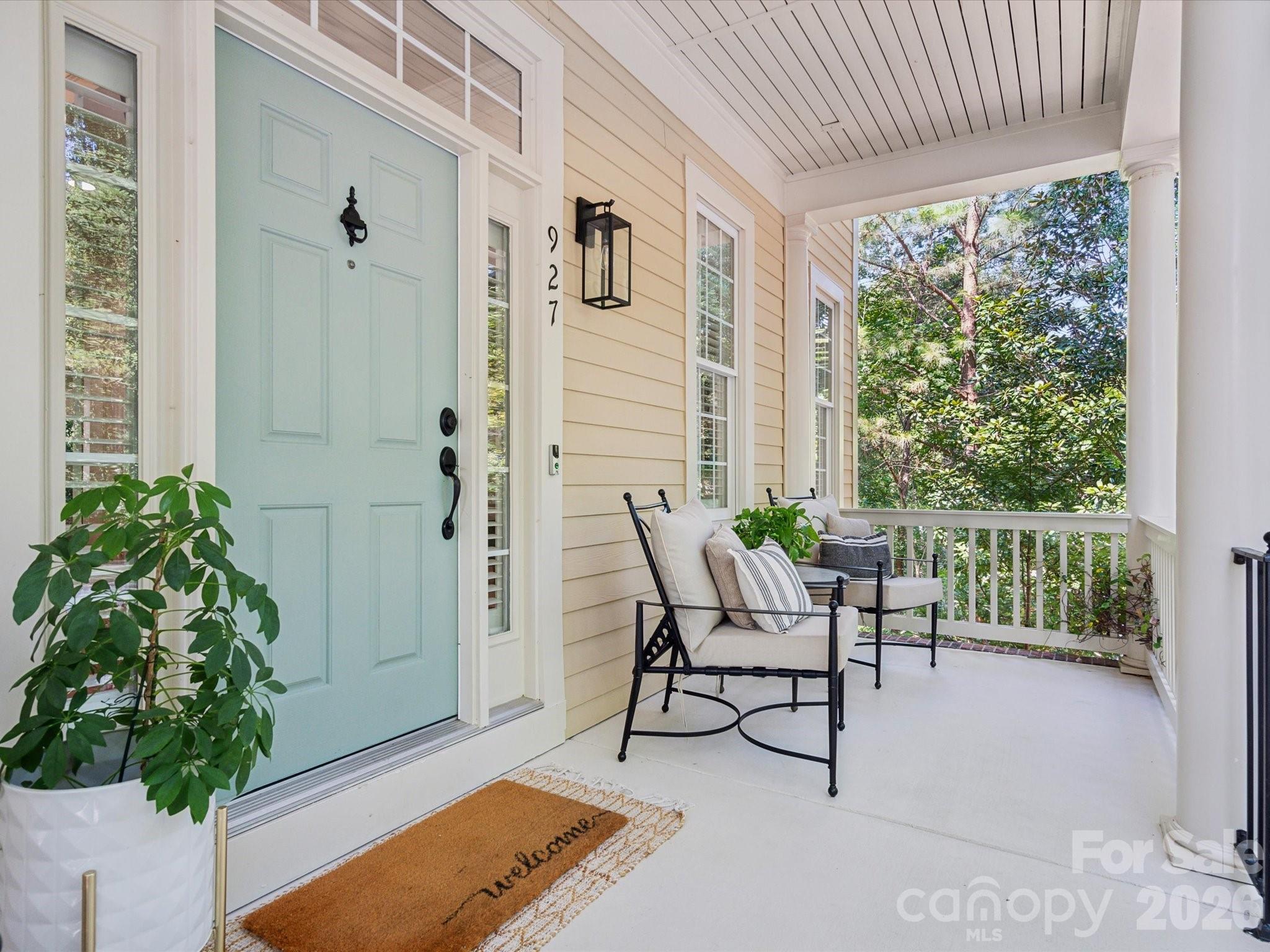 927 Derick's Crossing Fort Mill, SC 29708 - Photo 5 of 48 a outdoor living space with furniture and a potted plant