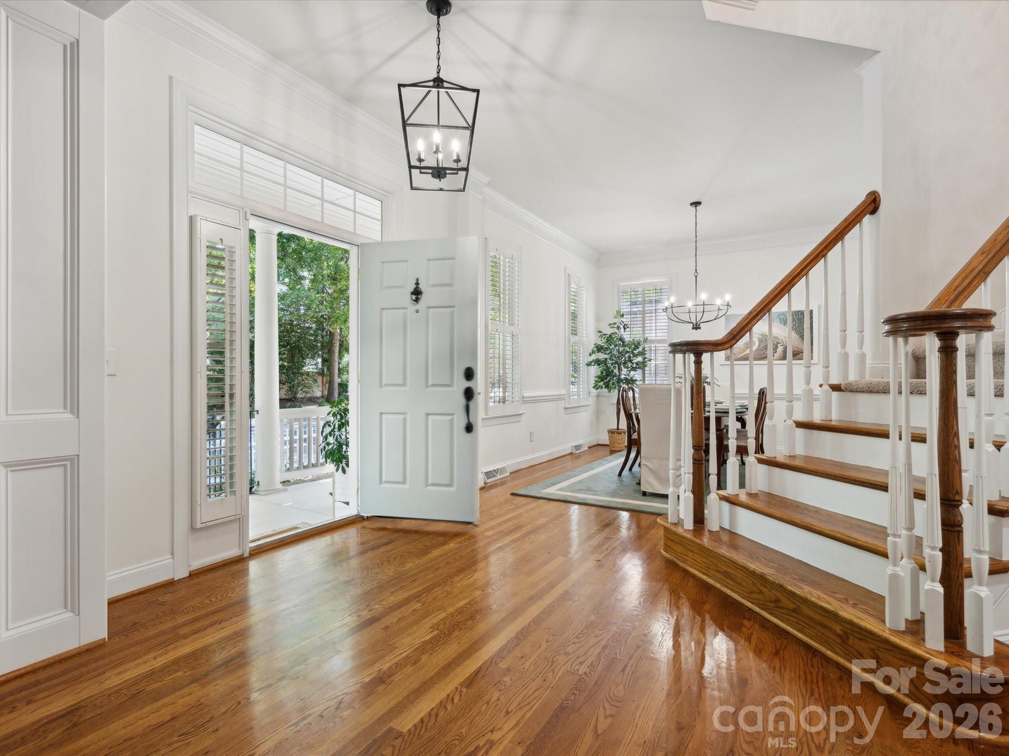 927 Derick's Crossing Fort Mill, SC 29708 - Photo 6 of 48 a view of entryway and hall with wooden floor