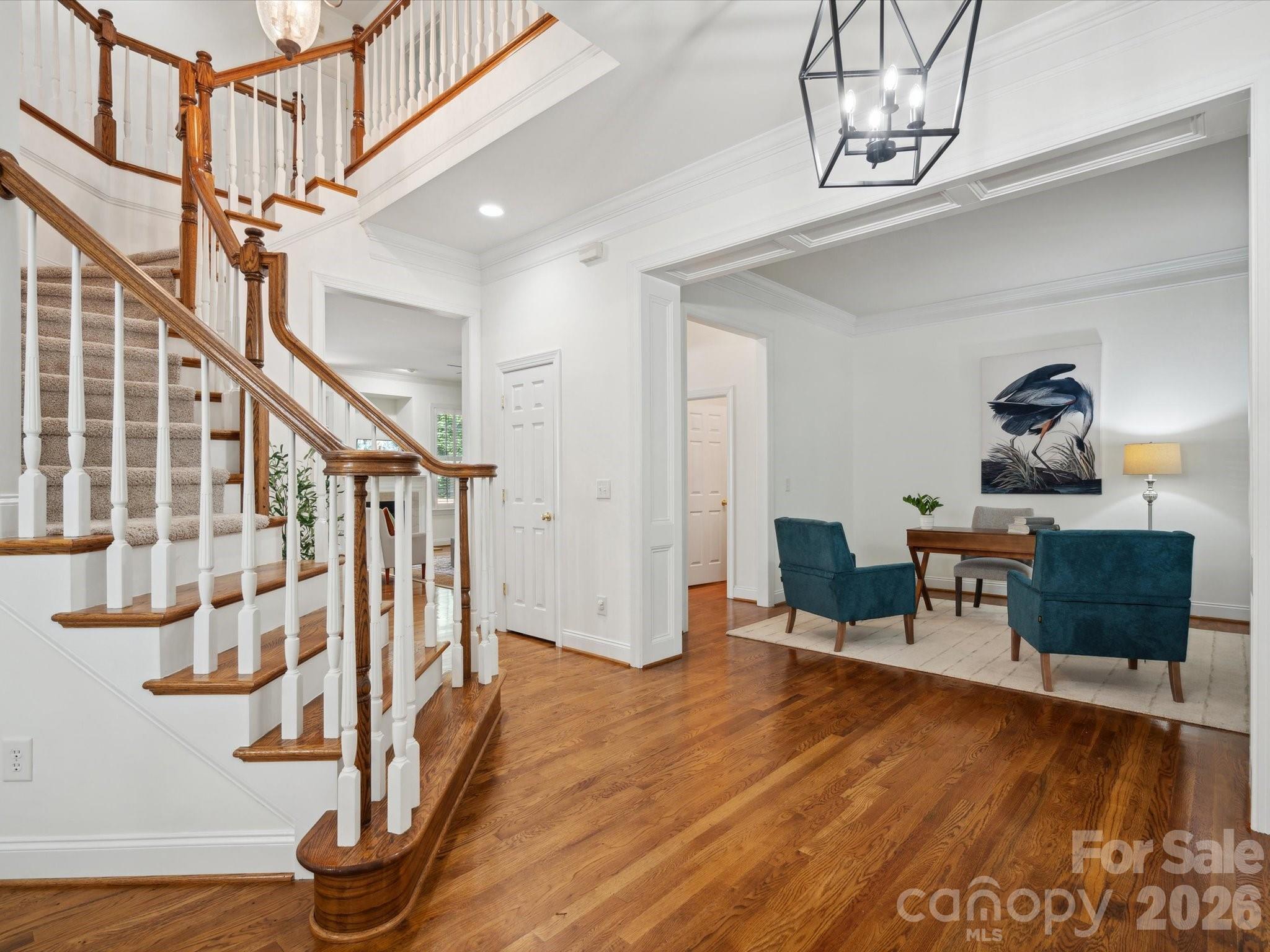 927 Derick's Crossing Fort Mill, SC 29708 - Photo 10 of 48 a living room with furniture and wooden floor