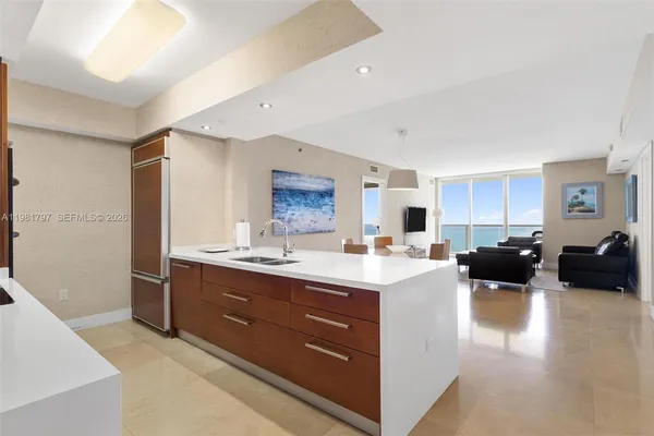 a kitchen with sink and lots of counter top space
