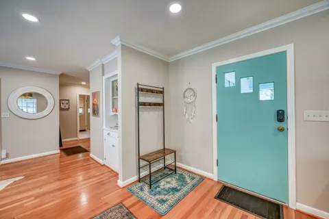 a view of a livingroom with wooden floor