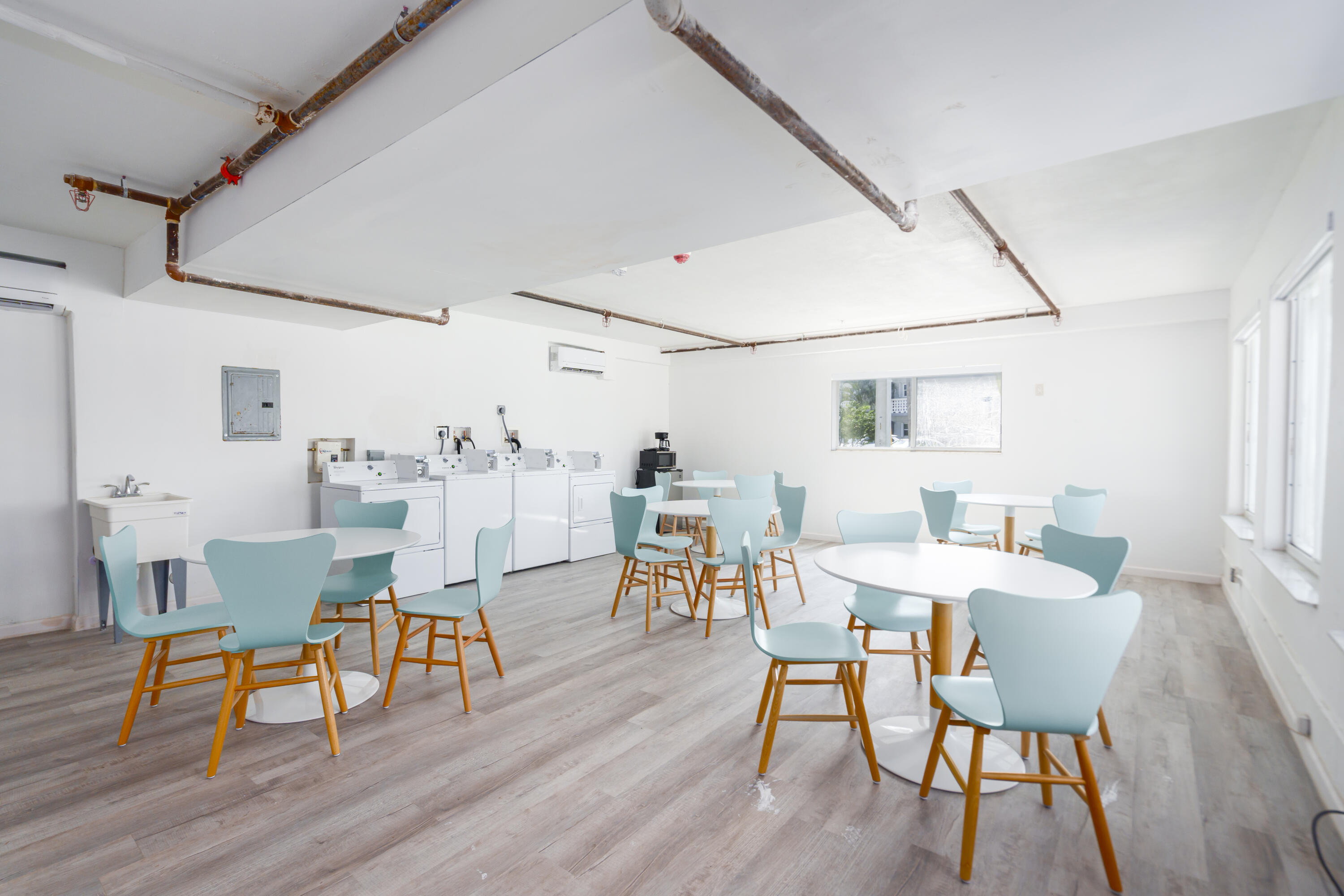 1020 North Riverside Drive, Unit 2 Pompano Beach, FL 33062 - Photo 13 of 14 a view of a dining room with furniture and wooden floor