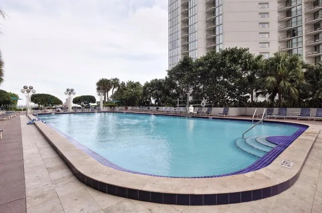 a view of a swimming pool with outdoor space