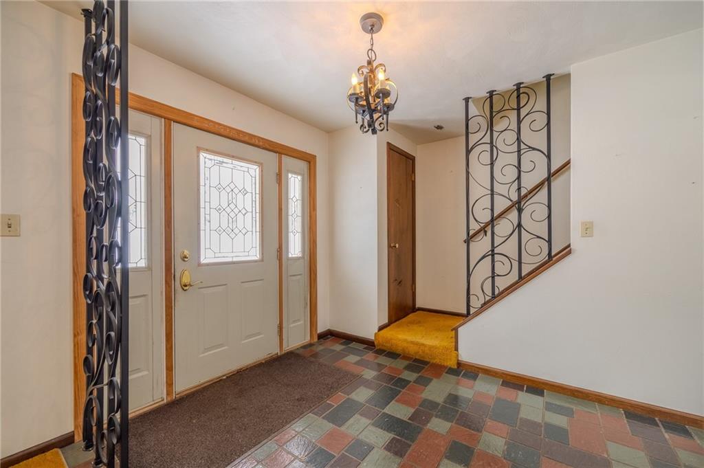 1142 Apples Mill Road West Newton, PA 15089 - Photo 4 of 32 a view of a room with wooden floor and windows