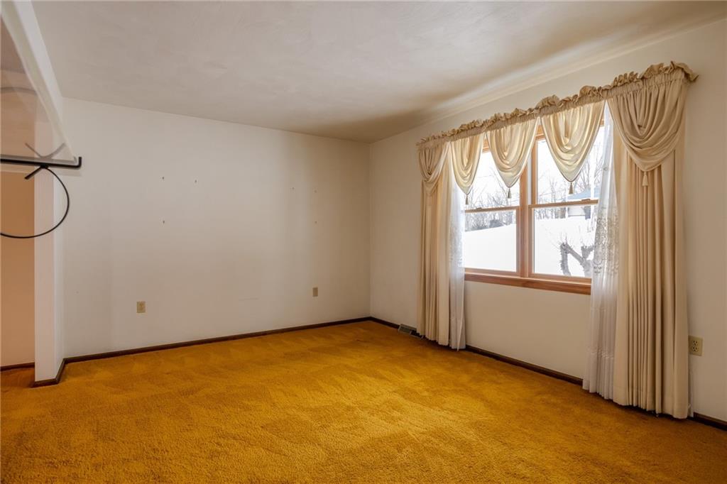 1142 Apples Mill Road West Newton, PA 15089 - Photo 7 of 32 an empty room with a window