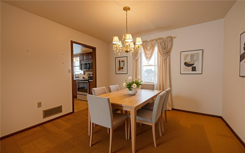 1142 Apples Mill Road West Newton, PA 15089 - Photo 8 of 32 a view of a dining room with furniture and window