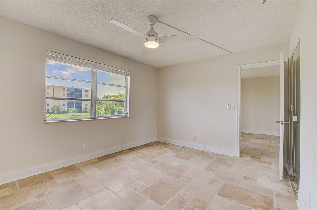 7940 Northwest 50th Street, Unit 203 Lauderhill, FL 33351 - Photo 11 of 36 an empty room with windows