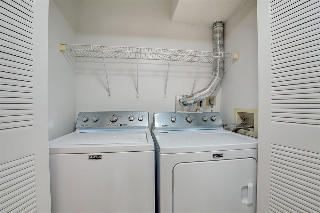 7940 Northwest 50th Street, Unit 203 Lauderhill, FL 33351 - Photo 15 of 36 a utility room with dryer and washer