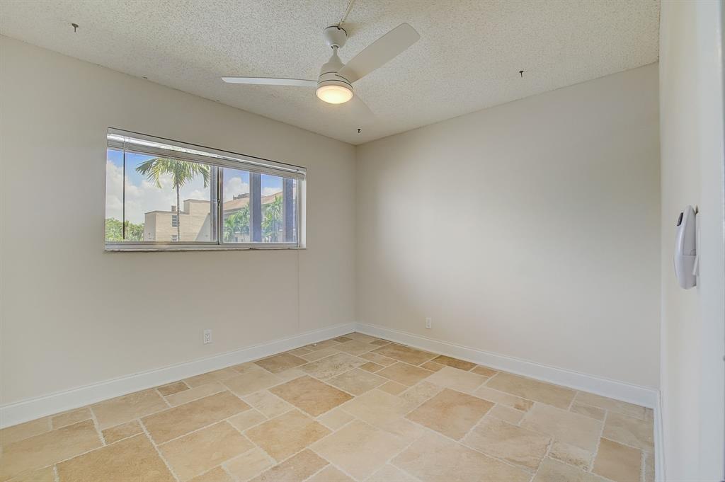 7940 Northwest 50th Street, Unit 203 Lauderhill, FL 33351 - Photo 18 of 36 an empty room with a window