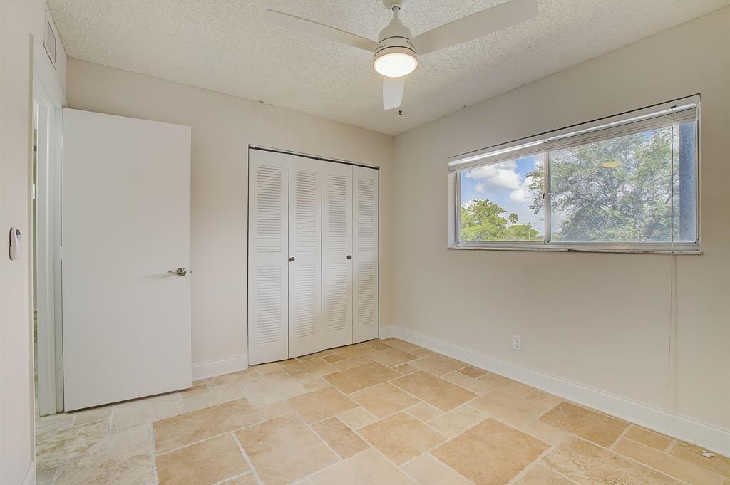 7940 Northwest 50th Street, Unit 203 Lauderhill, FL 33351 - Photo 20 of 36 a view of an empty room with a window