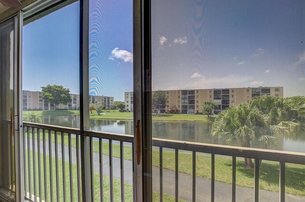 7940 Northwest 50th Street, Unit 203 Lauderhill, FL 33351 - Photo 22 of 36 a view of a balcony