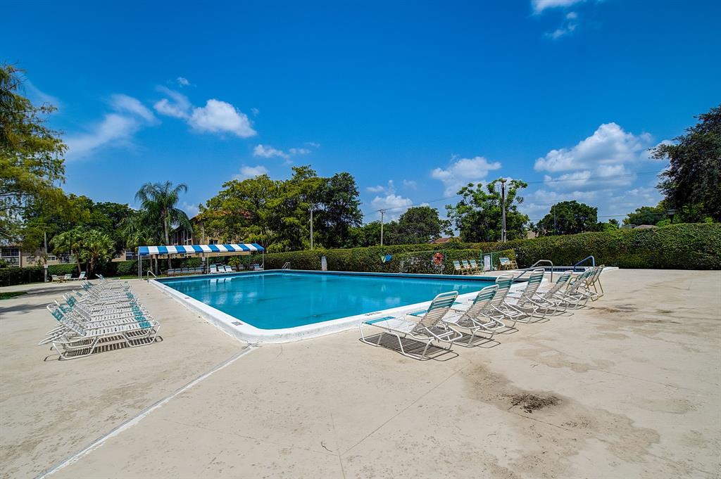 7940 Northwest 50th Street, Unit 203 Lauderhill, FL 33351 - Photo 27 of 36 a view of a park with large trees