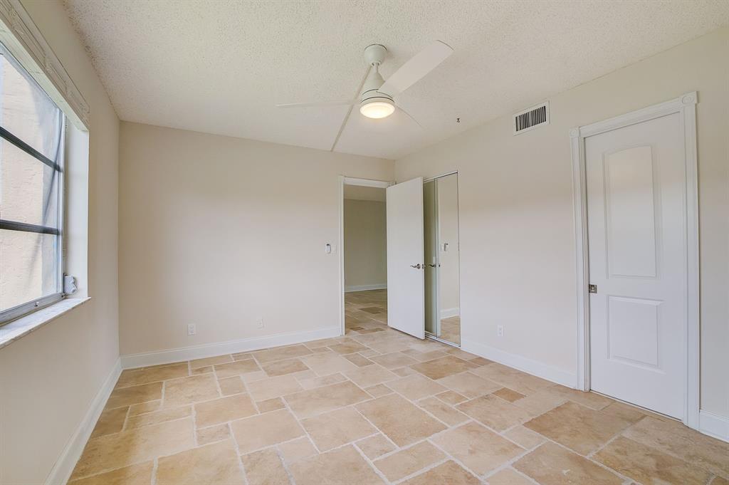 7940 Northwest 50th Street, Unit 203 Lauderhill, FL 33351 - Photo 10 of 36 a view of an empty room