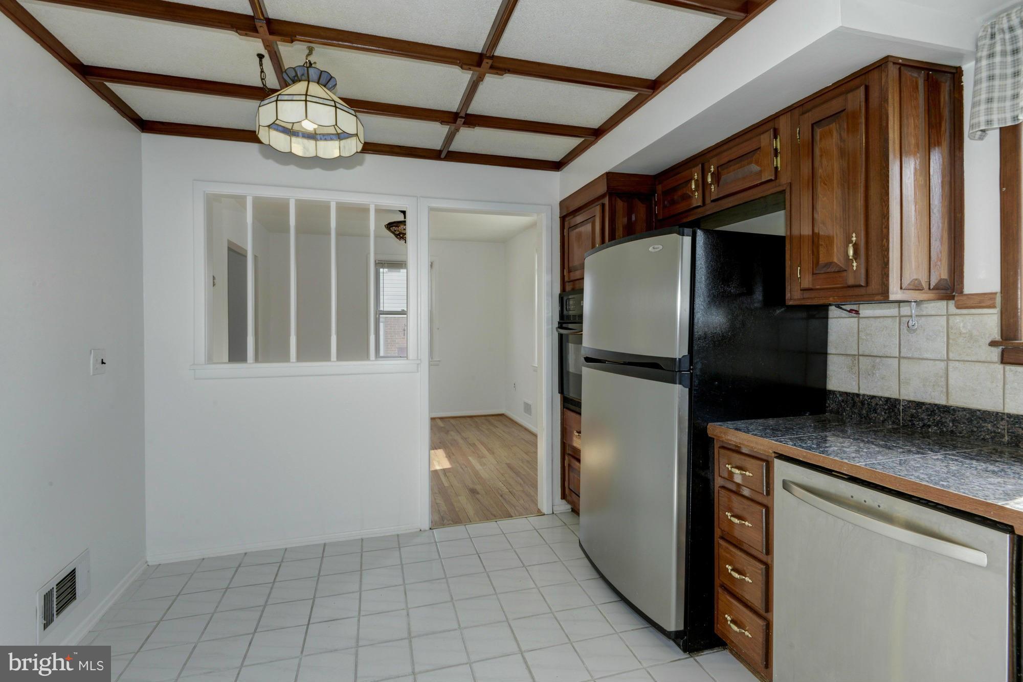 905 Arran Road Baltimore, MD 21239 - Photo 15 of 30 Pass-through to dining room