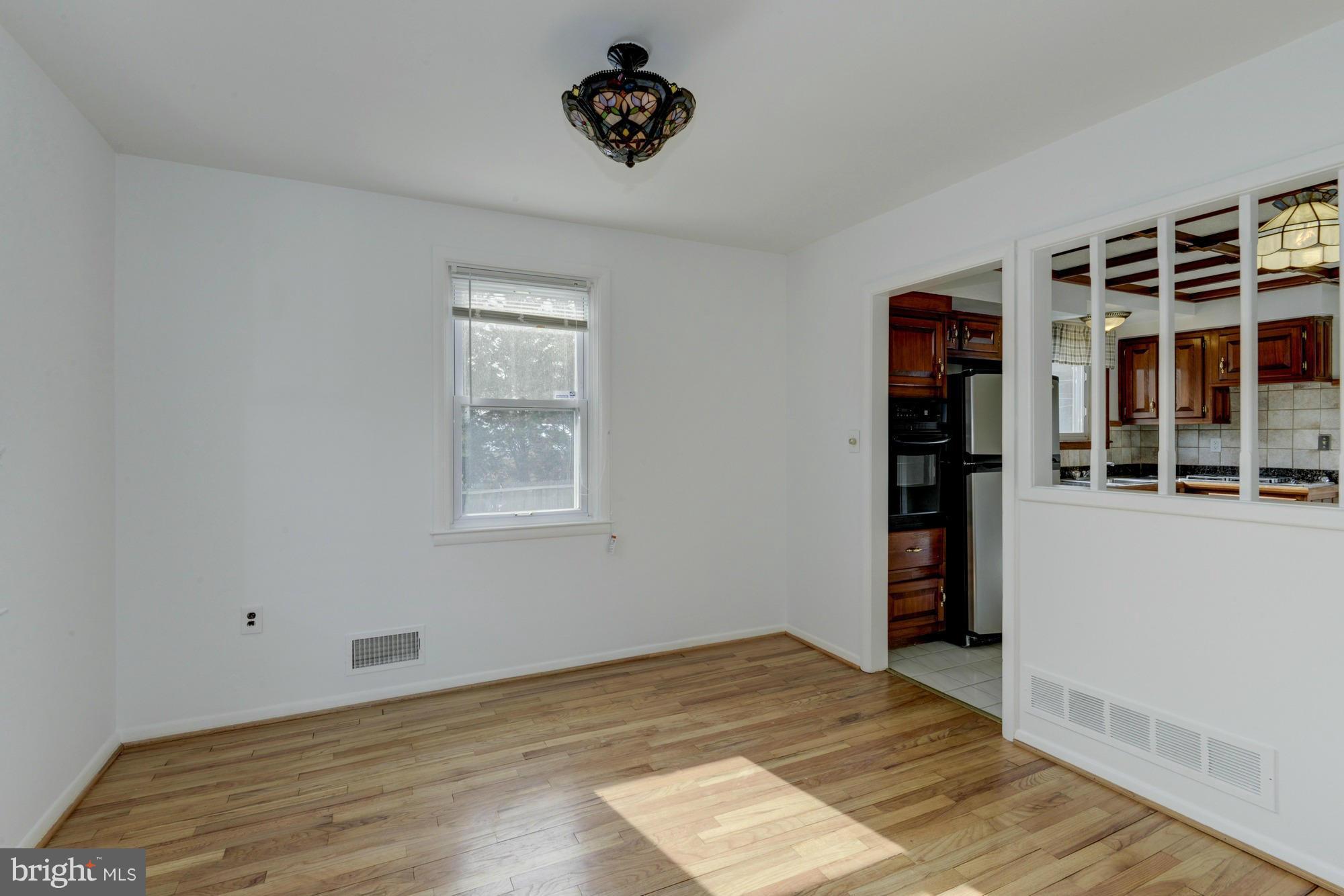 905 Arran Road Baltimore, MD 21239 - Photo 10 of 30 Dining Room with pass-through to kitchen