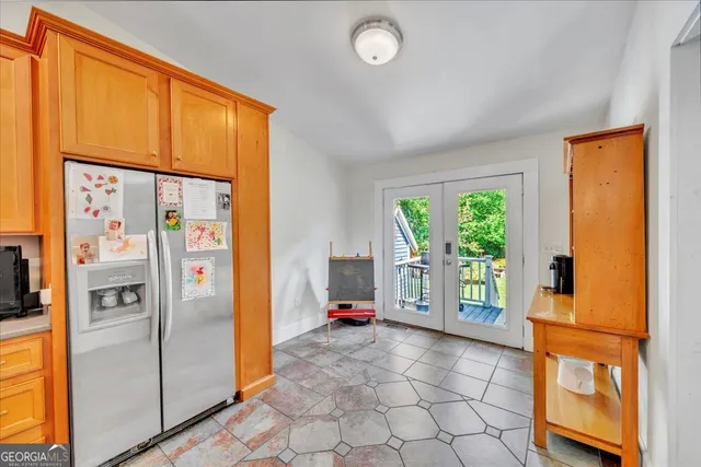 a view of a kitchen with furniture and a window