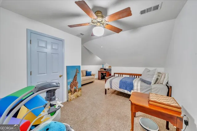 a view of a porch with a garden