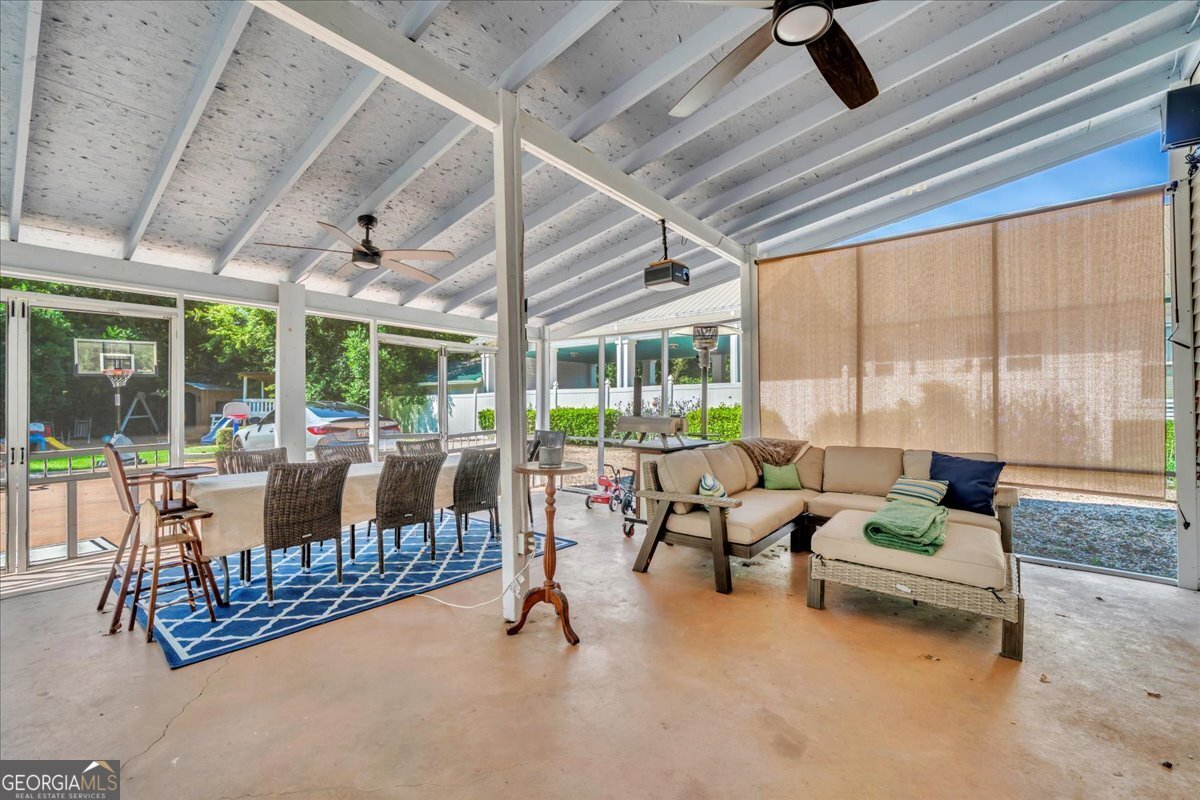 712 Stonewall Street Dublin, GA 31021 - Photo 64 of 65 a living room with furniture and a large window