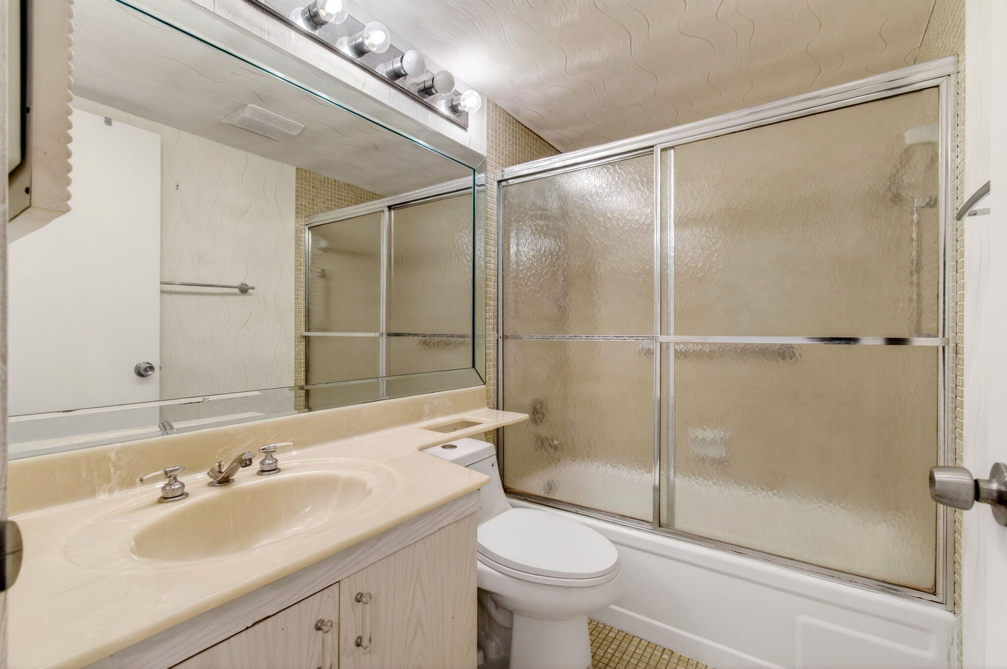 2027 Exeter Boca Raton, FL 33434 - Photo 36 of 100 a bathroom with a sink toilet and shower