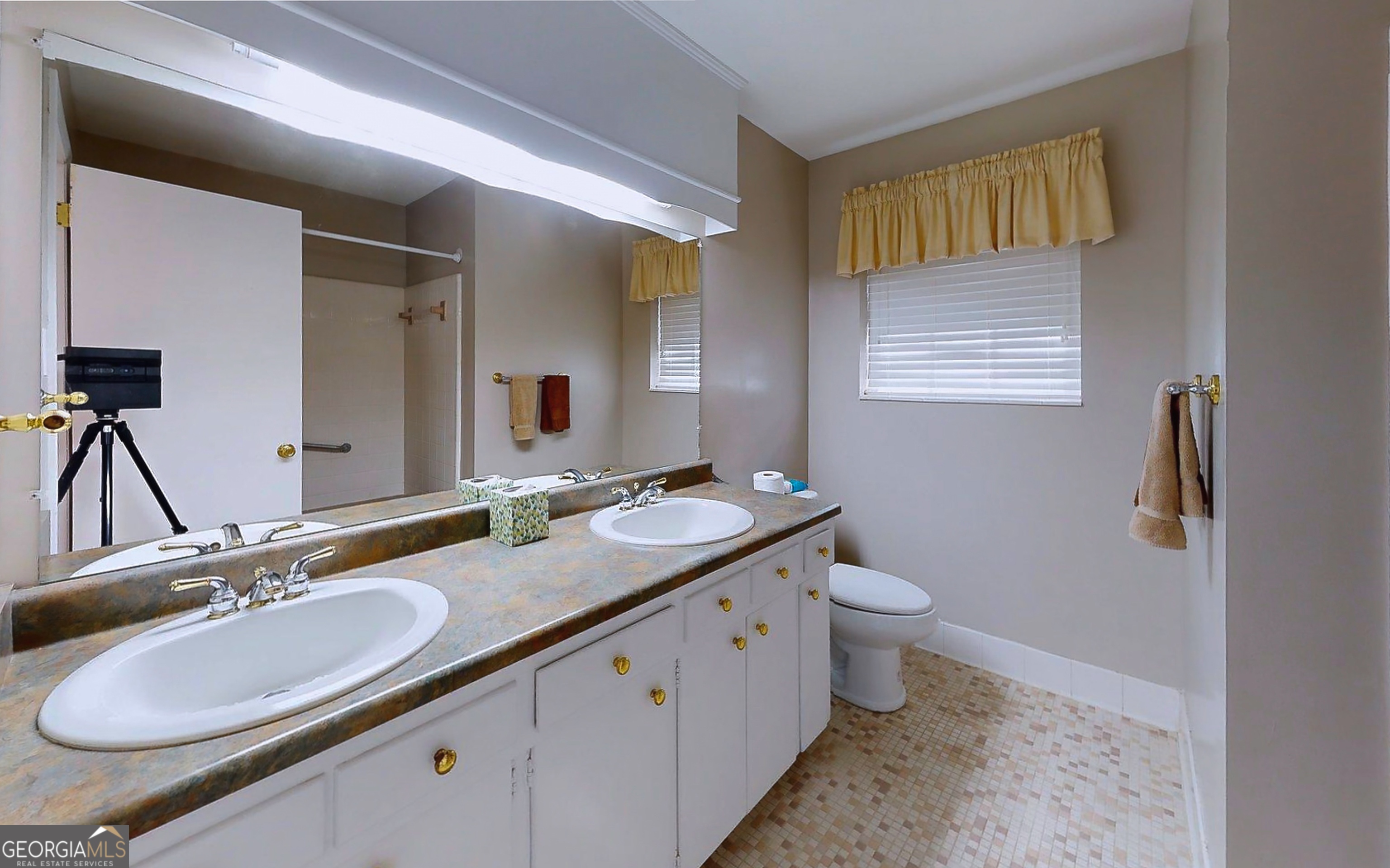 104 Azalea Lane Reidsville, GA 30453 - Photo 28 of 50 a bathroom with a granite countertop sink and a mirror