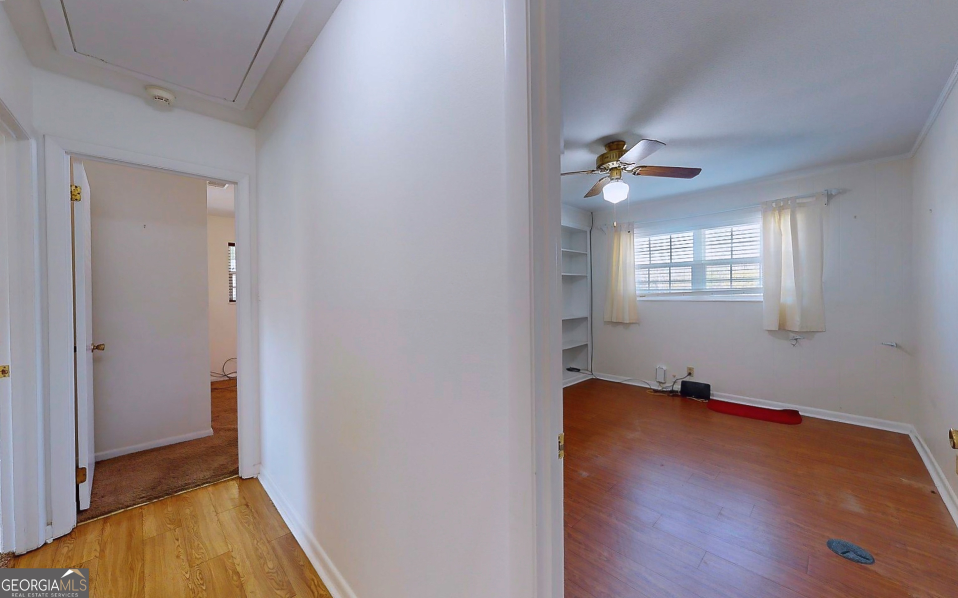 104 Azalea Lane Reidsville, GA 30453 - Photo 35 of 50 wooden floor in an empty room with a window