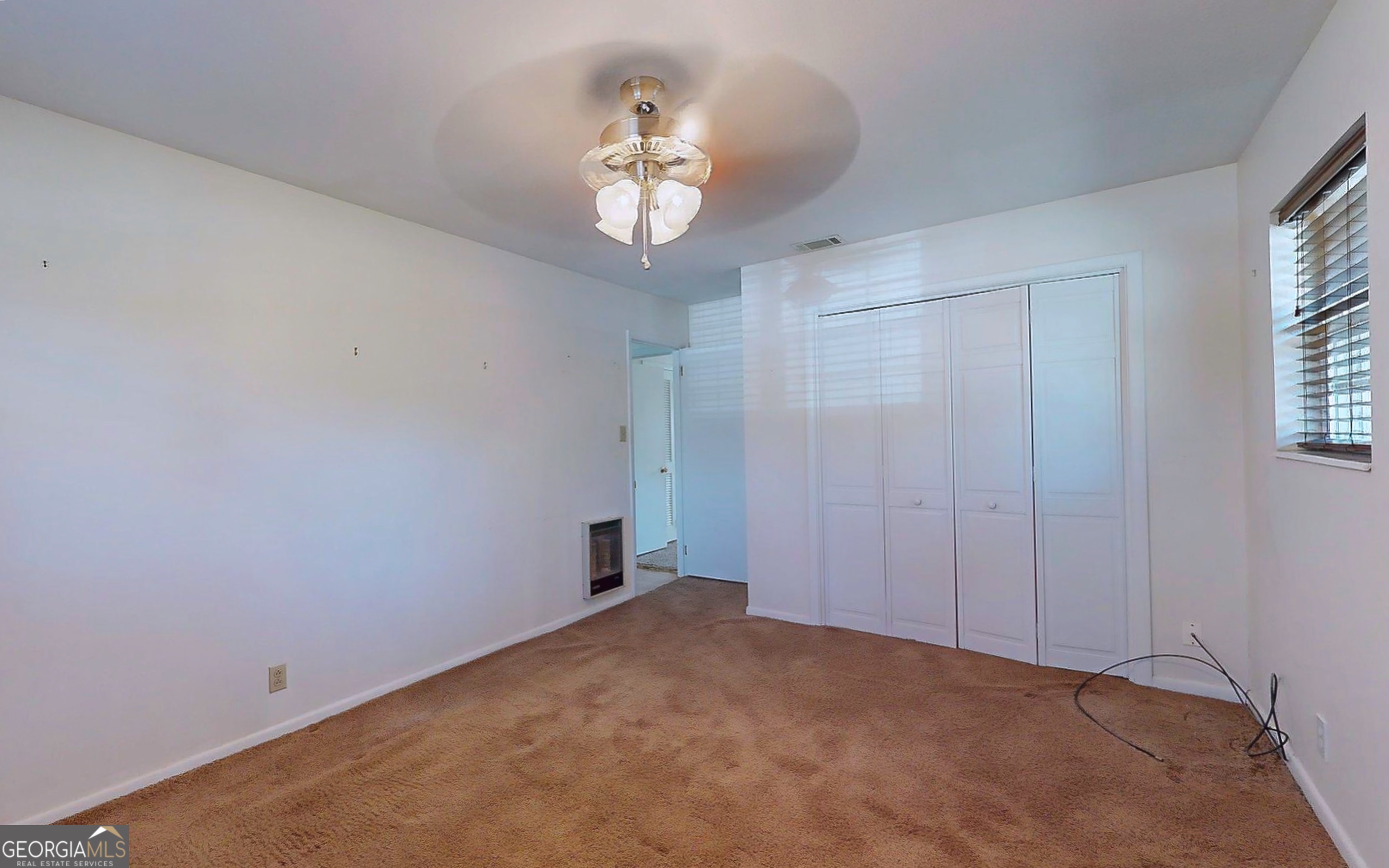 104 Azalea Lane Reidsville, GA 30453 - Photo 37 of 50 a view of a chandelier in big room and chandelier fan