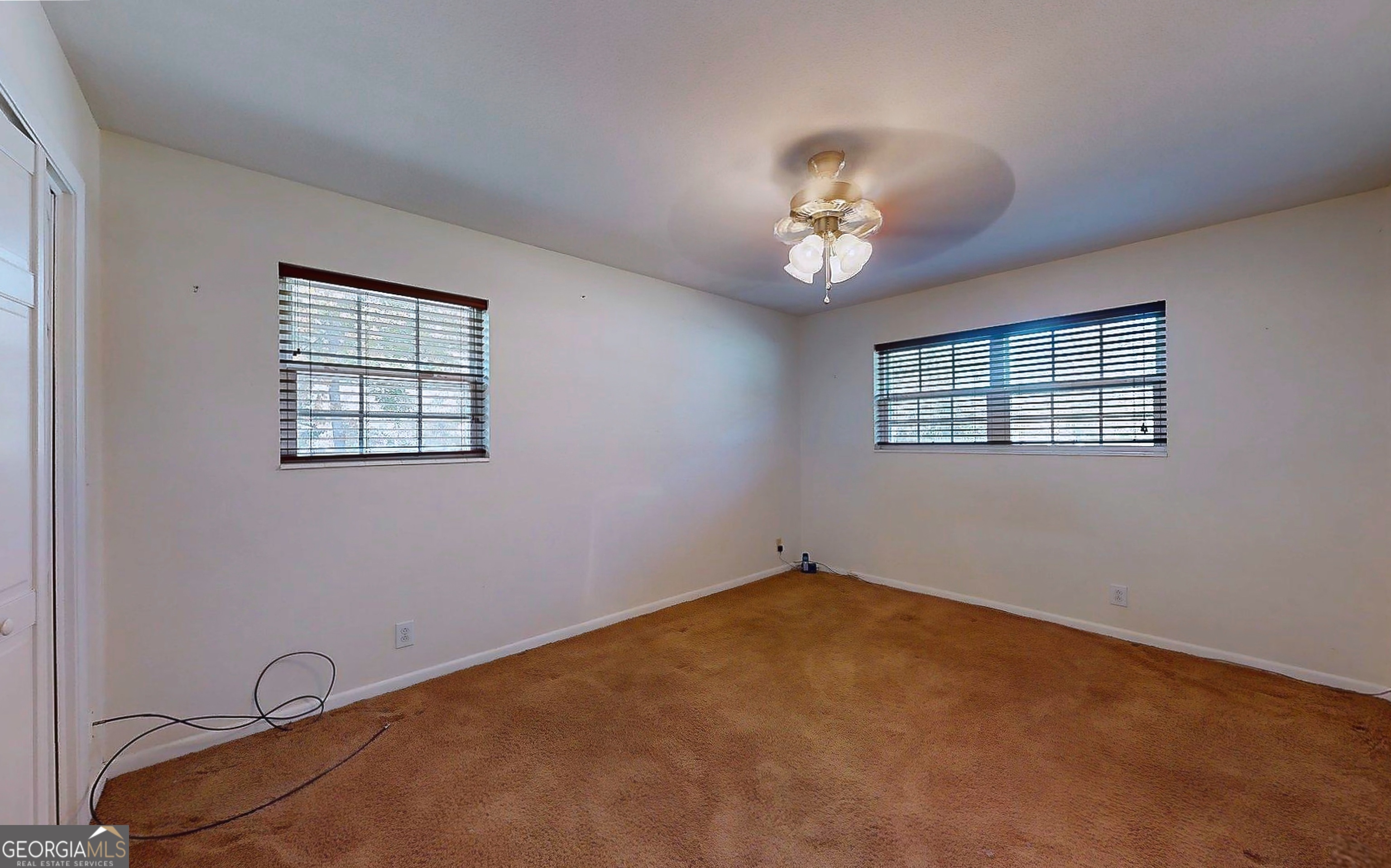 104 Azalea Lane Reidsville, GA 30453 - Photo 38 of 50 a view of an empty room with a window