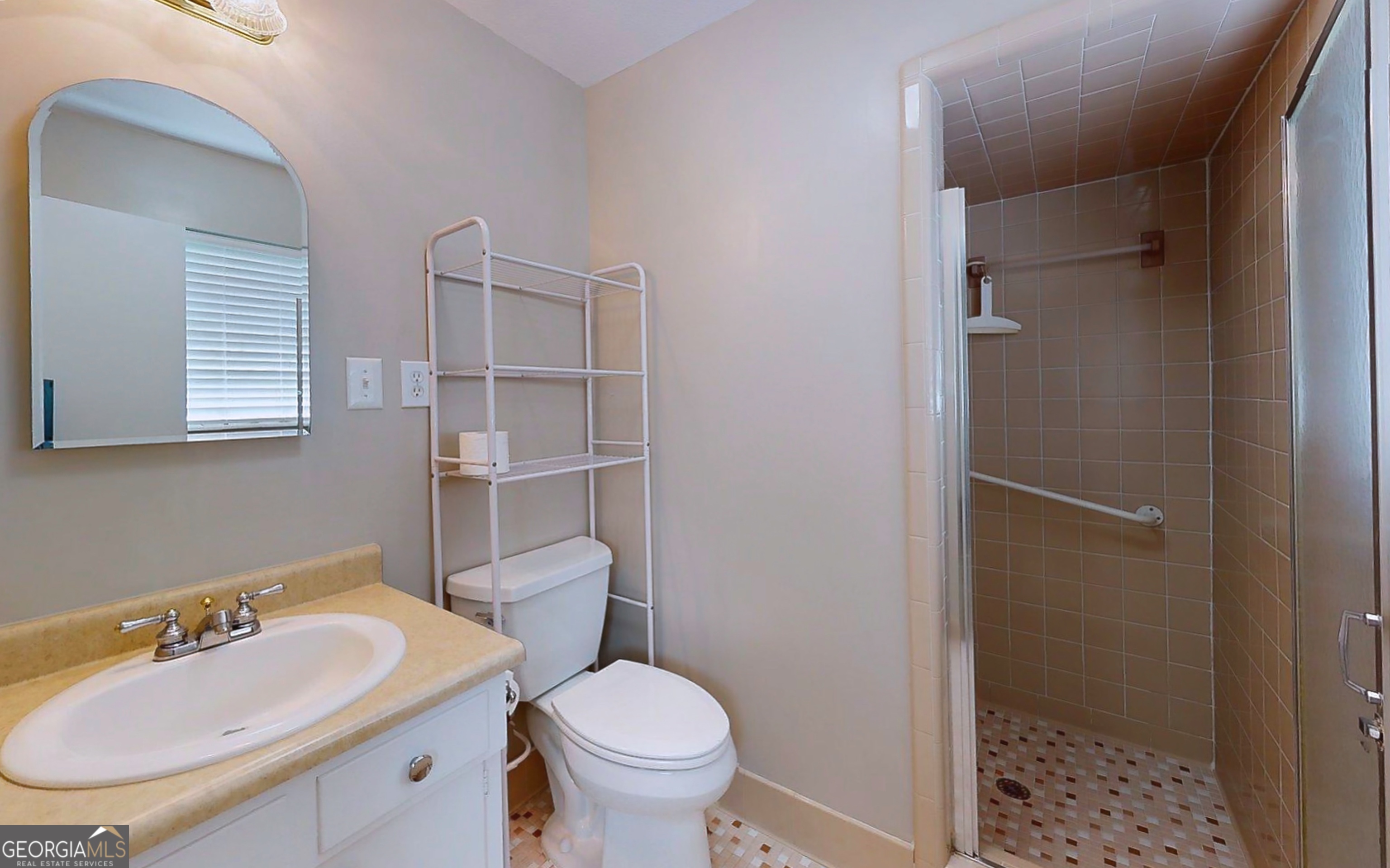 104 Azalea Lane Reidsville, GA 30453 - Photo 44 of 50 a bathroom with a sink toilet and shower
