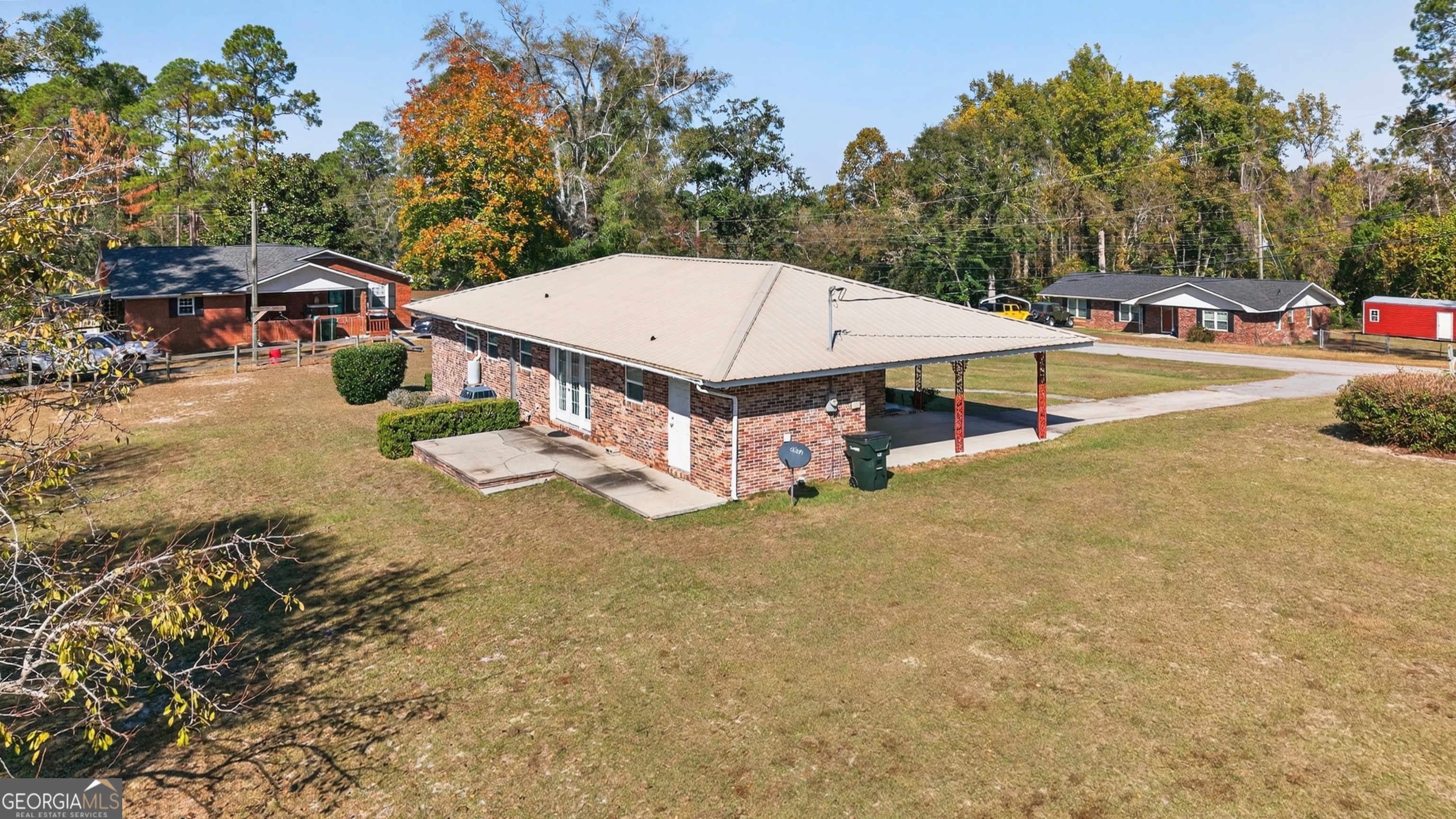 104 Azalea Lane Reidsville, GA 30453 - Photo 5 of 50 an outdoor space with pool and furniture