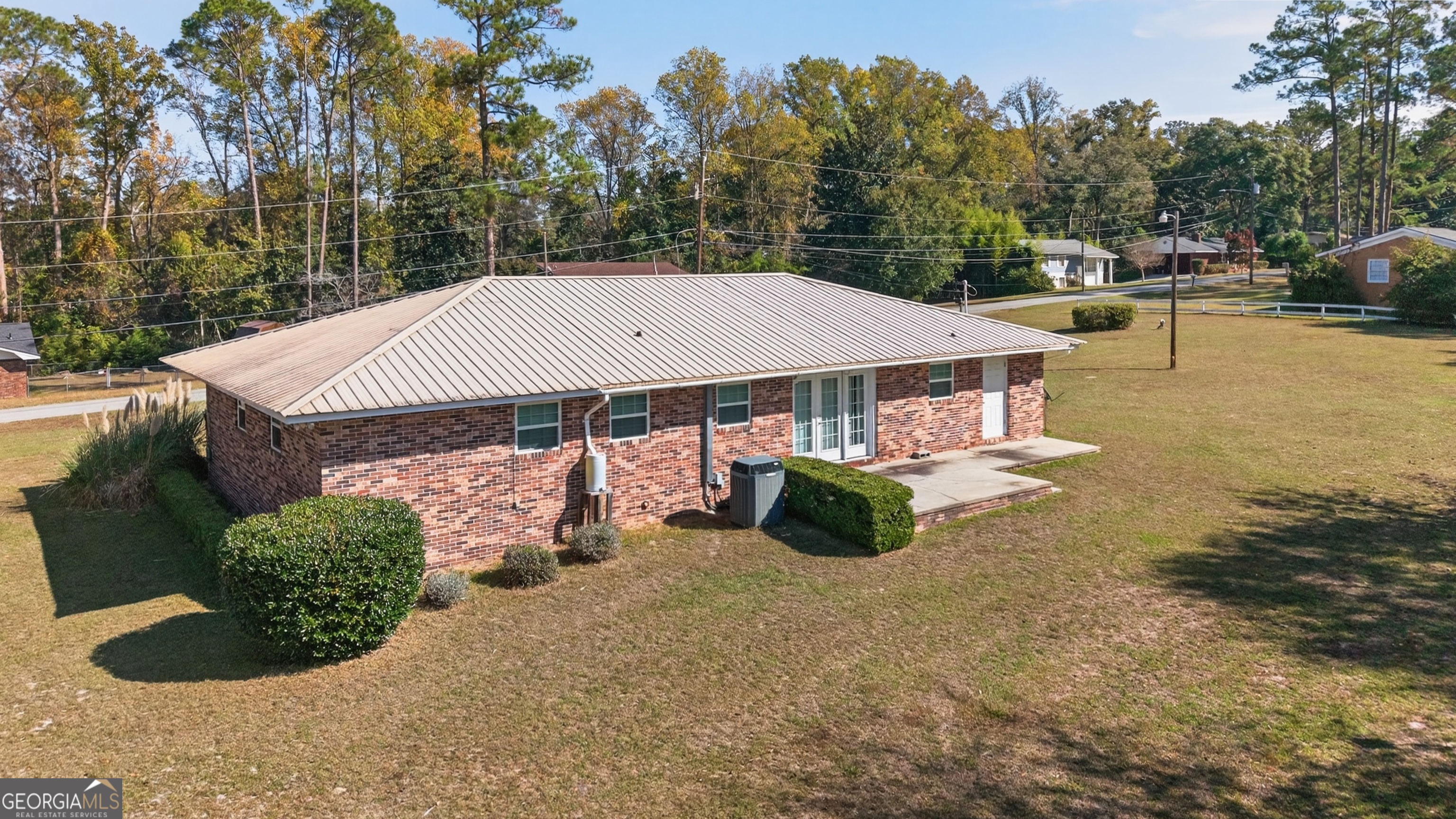 104 Azalea Lane Reidsville, GA 30453 - Photo 6 of 50 an outdoor space with furniture and garden