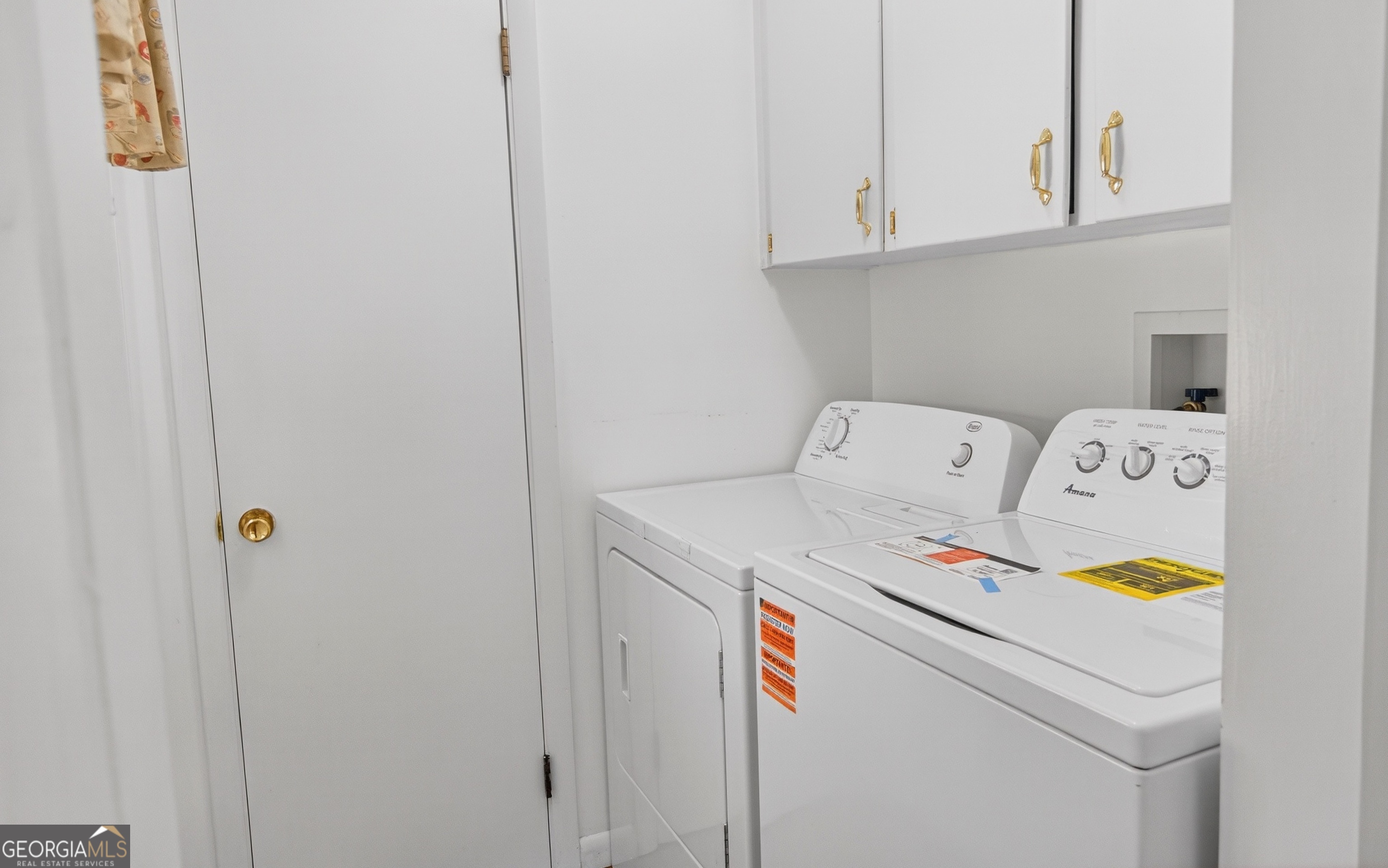104 Azalea Lane Reidsville, GA 30453 - Photo 9 of 50 a utility room with dryer and washer