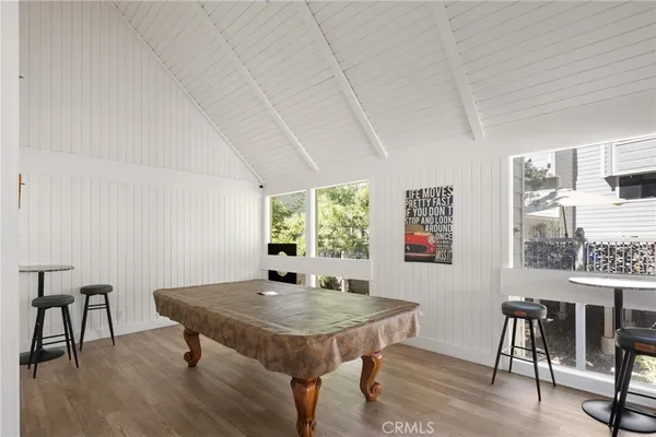 a view of a lake with a bench next to a lake