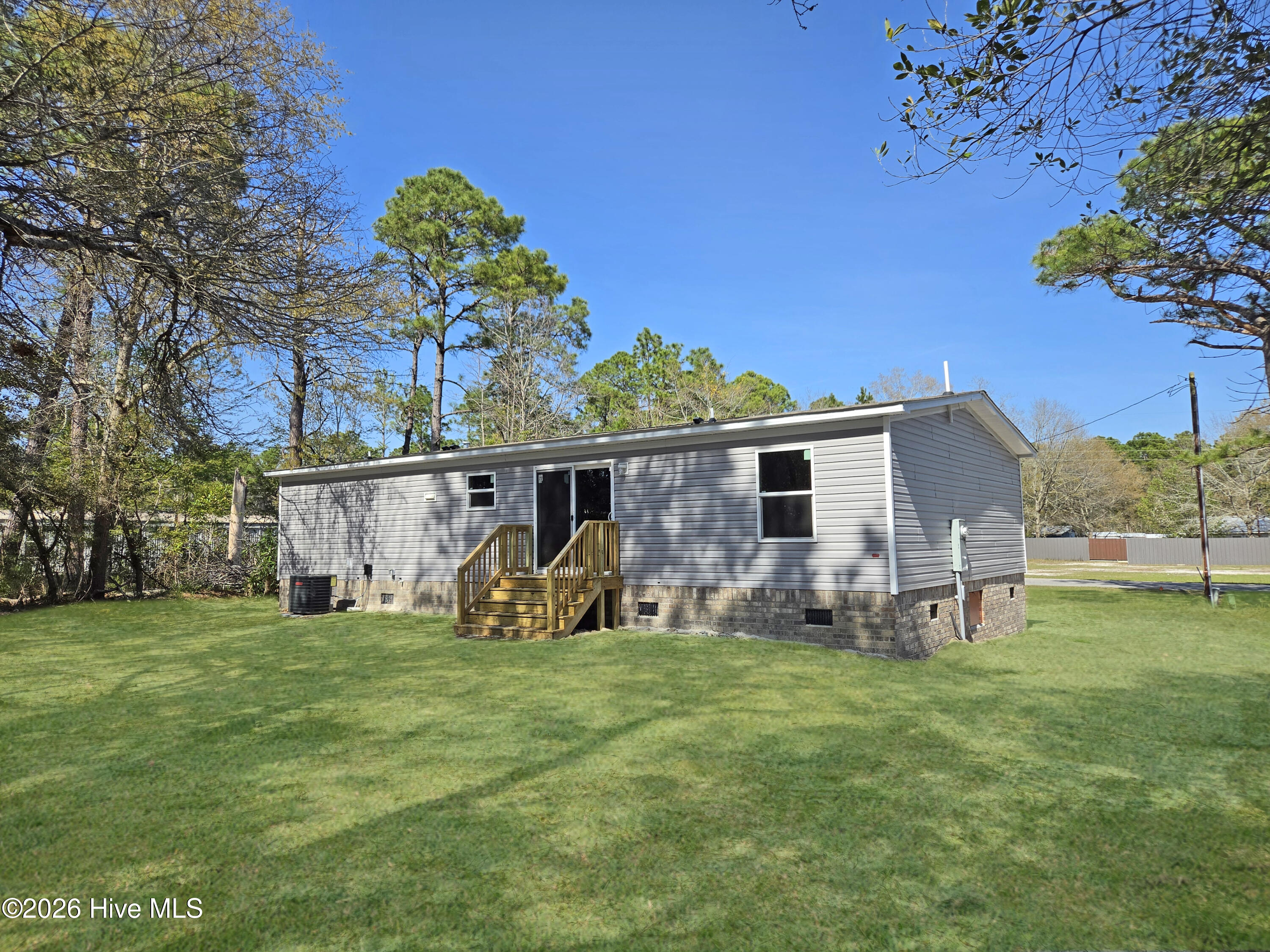 1451 Mockingbird Place Southwest Shallotte, NC 28470 - Photo 31 of 34 Back