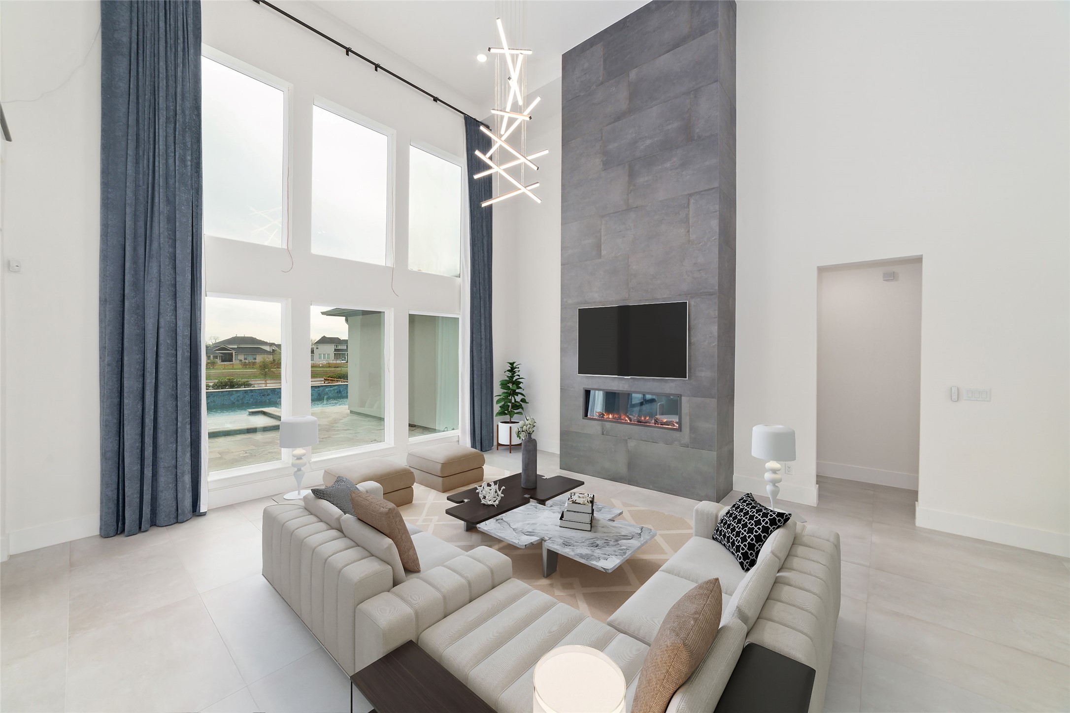 29627 Cir S Rnch Trail Fulshear, TX 77406 - Photo 12 of 50 Soaring ceilings, expansive glass, and breathtaking lake views create a living space that's every bit as comfortable as it is unforgettable.