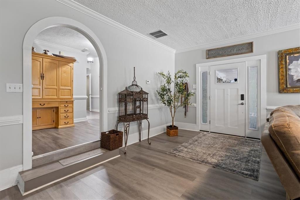 564 Eskew Road McDonough, GA 30252 - Photo 15 of 54 a view of livingroom with furniture and a flat screen tv