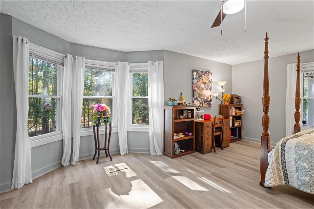 564 Eskew Road McDonough, GA 30252 - Photo 26 of 54 a view of a livingroom with furniture and a window