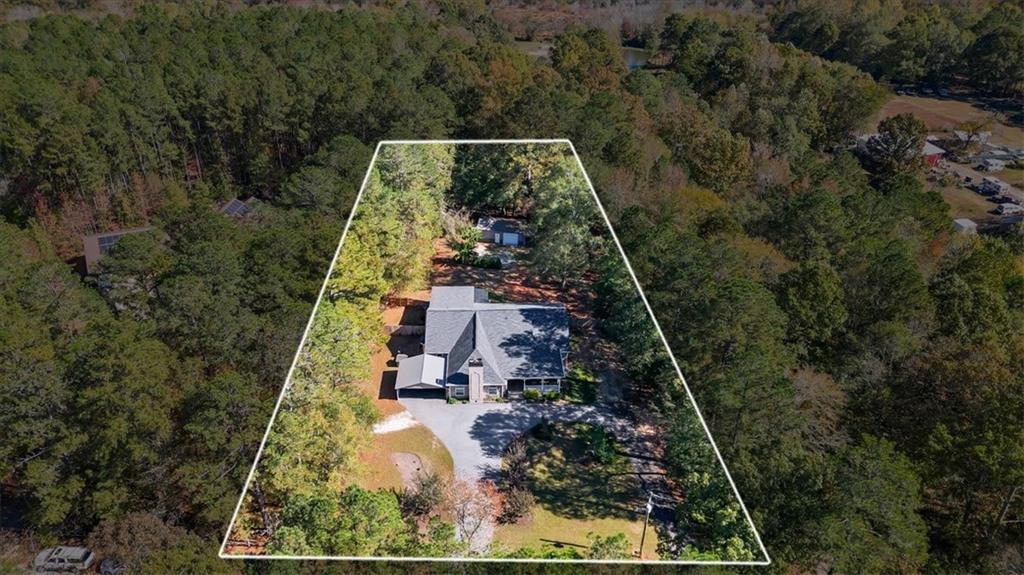 564 Eskew Road McDonough, GA 30252 - Photo 49 of 54 an aerial view of residential house with outdoor space